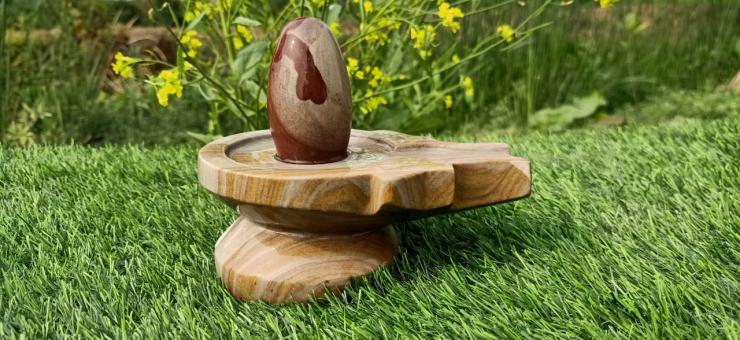 Nrmada Stones Shivling with Damru Shape Jaldhari